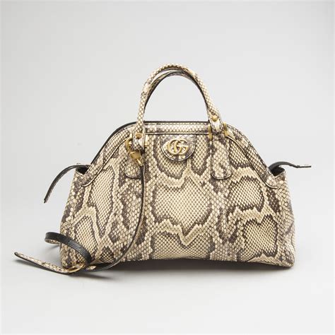 gucci snakeskin handbags.